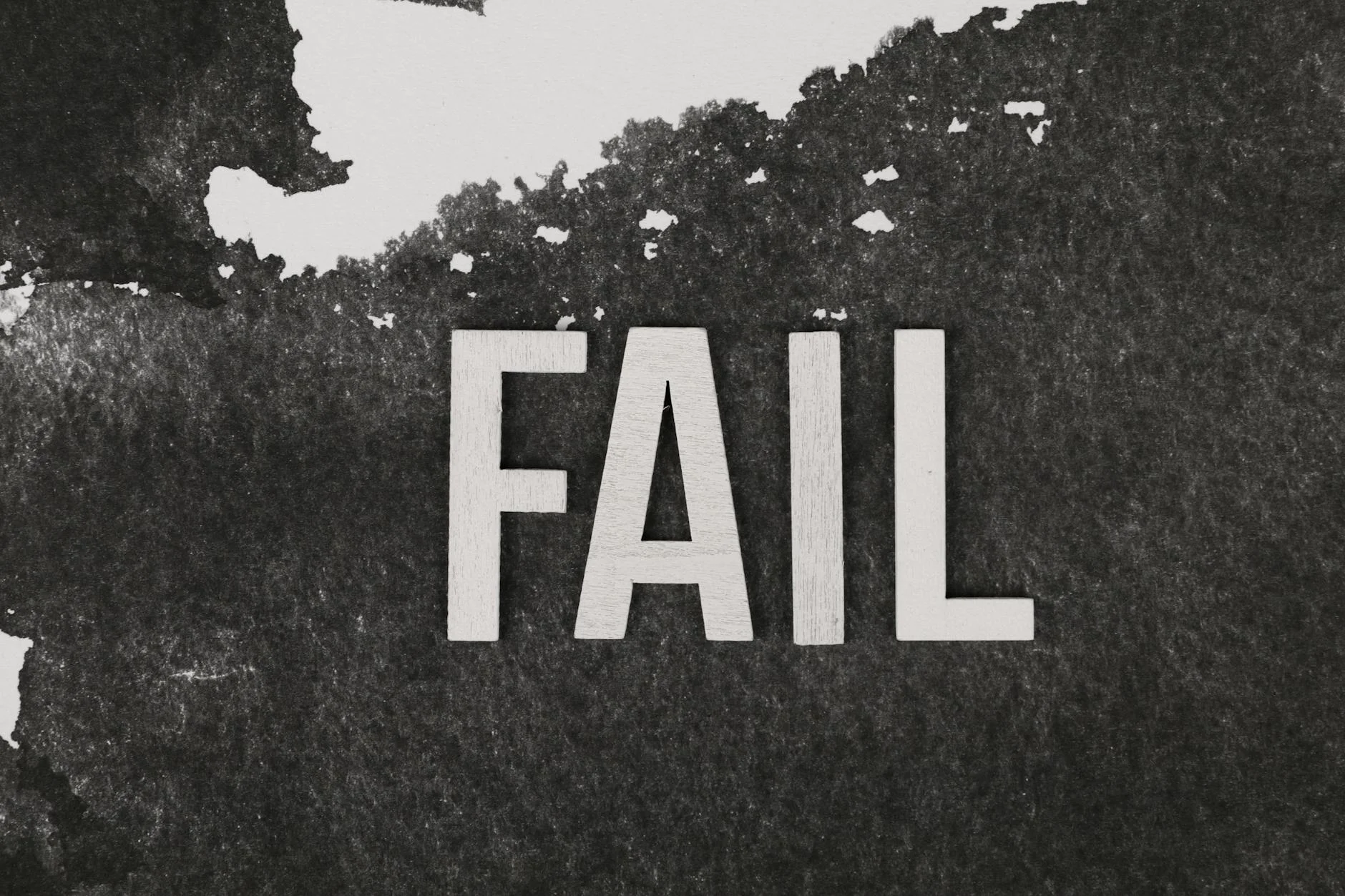 A typography poster with bold letterforms arranged in a deliberate visual layout