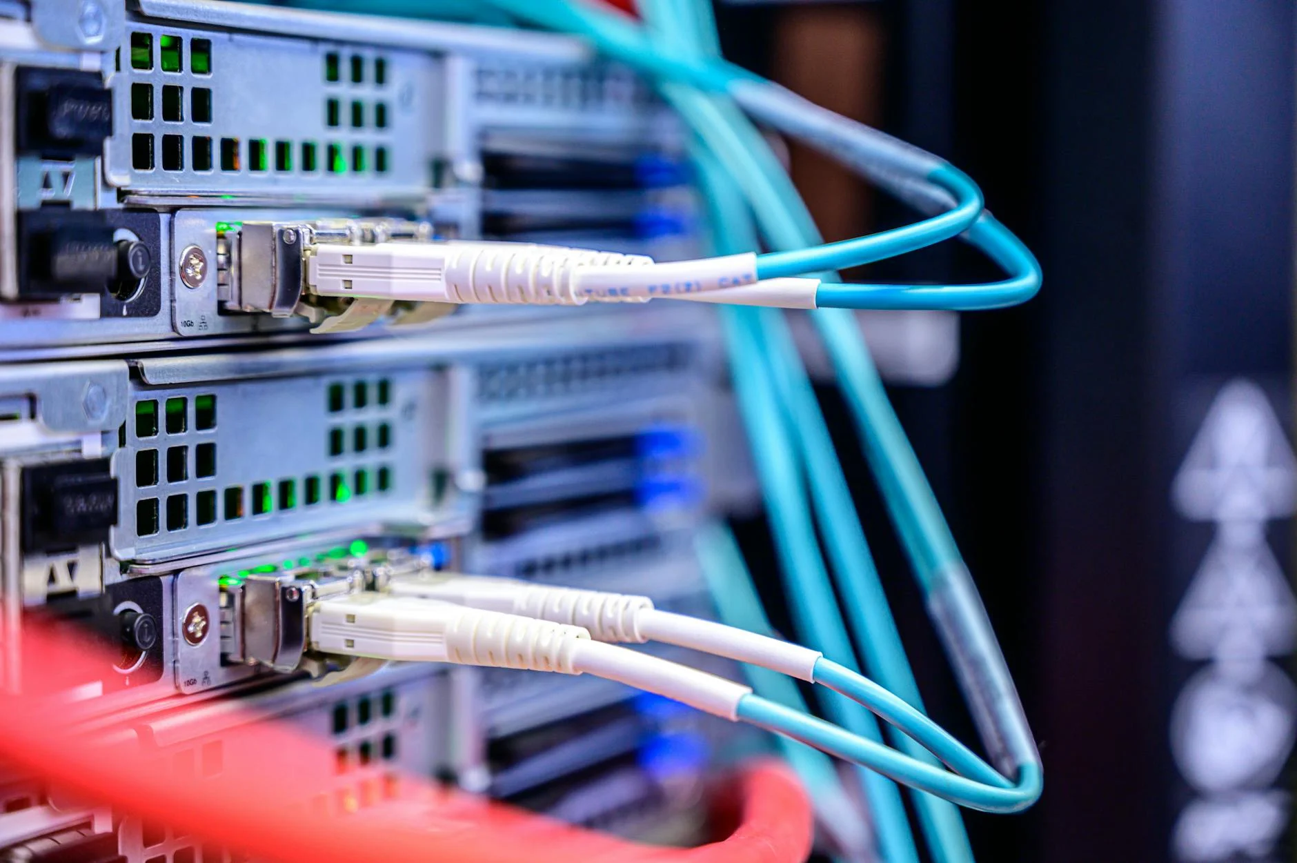 Data center cooling infrastructure with pipes and cables close-up