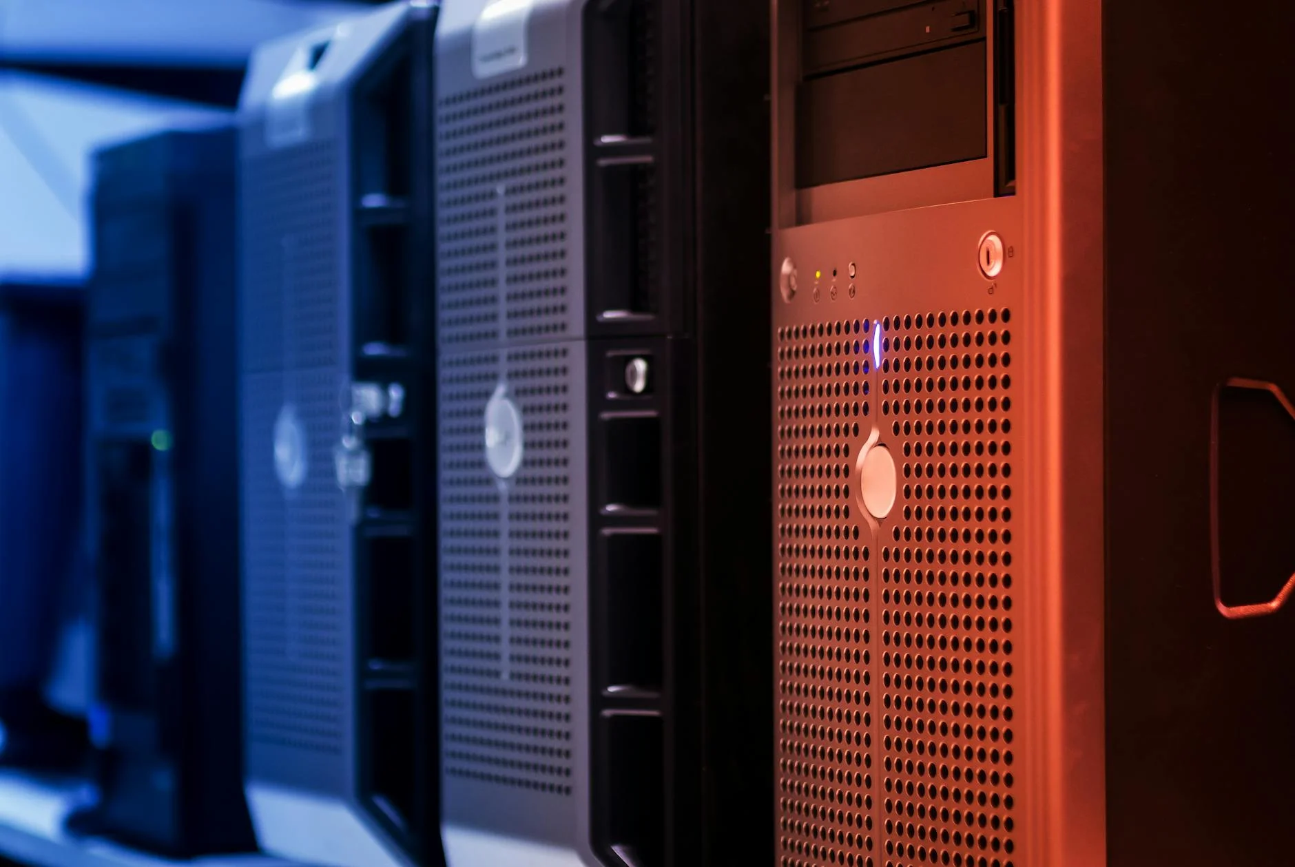 Server rack with blinking status lights inside a data center