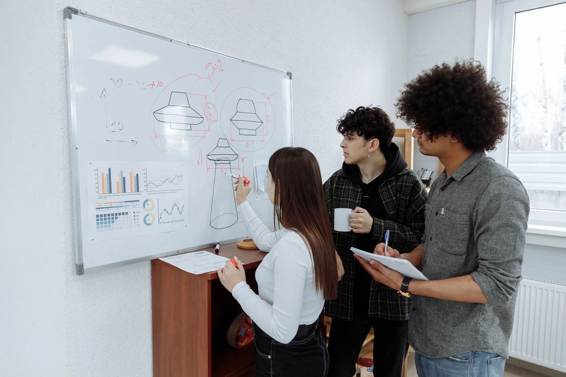A whiteboard with sticky notes and hand-drawn flow arrows mapping user actions and confirmation states