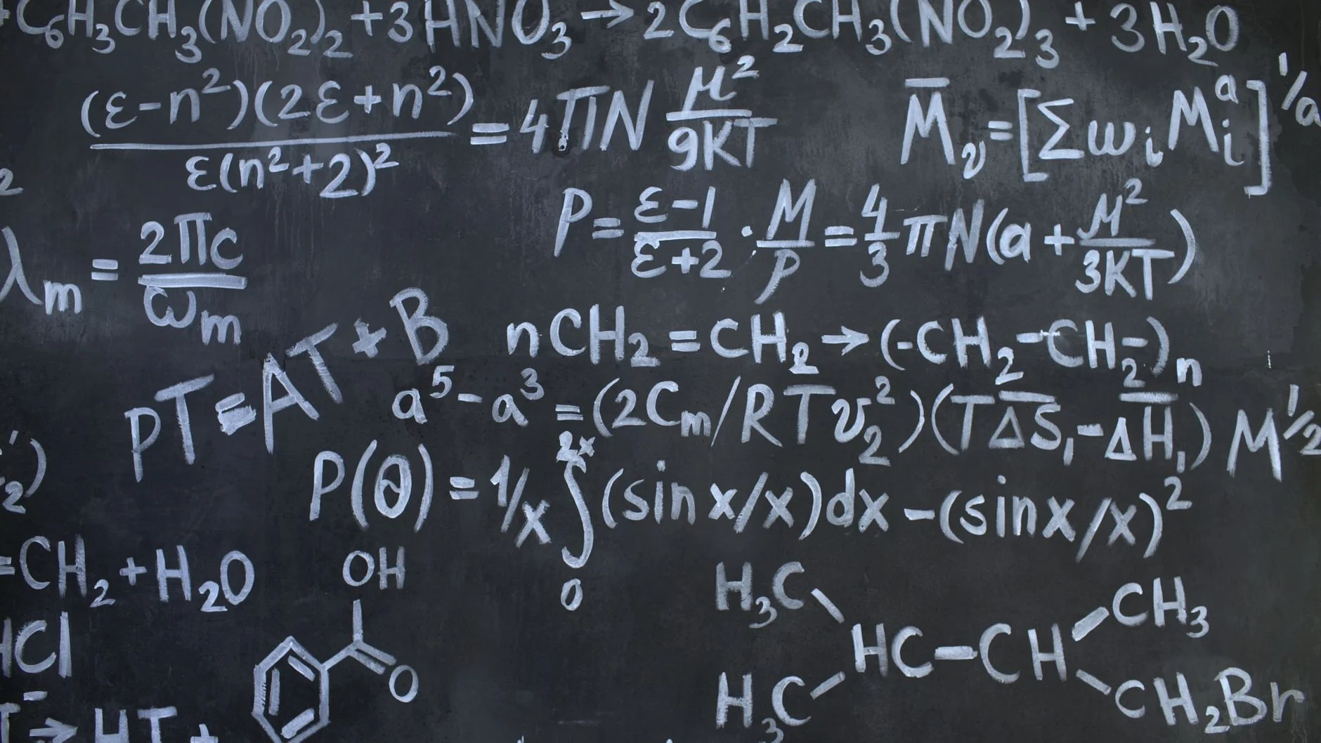 A chalkboard covered in handwritten notes and diagrams, representing documented conventions for a codebase